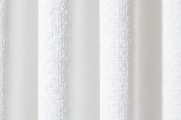 Synthetic staple woven curtain fabric