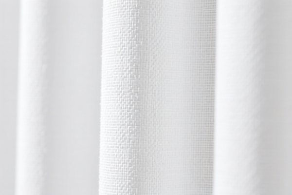 Synthetic staple woven curtain fabric