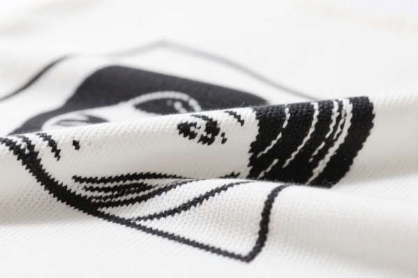 Printed synthetic knitted fabric